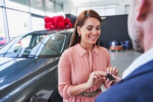 A car buyer with their new vehicle - car loan broker with Ezy Loans Australia