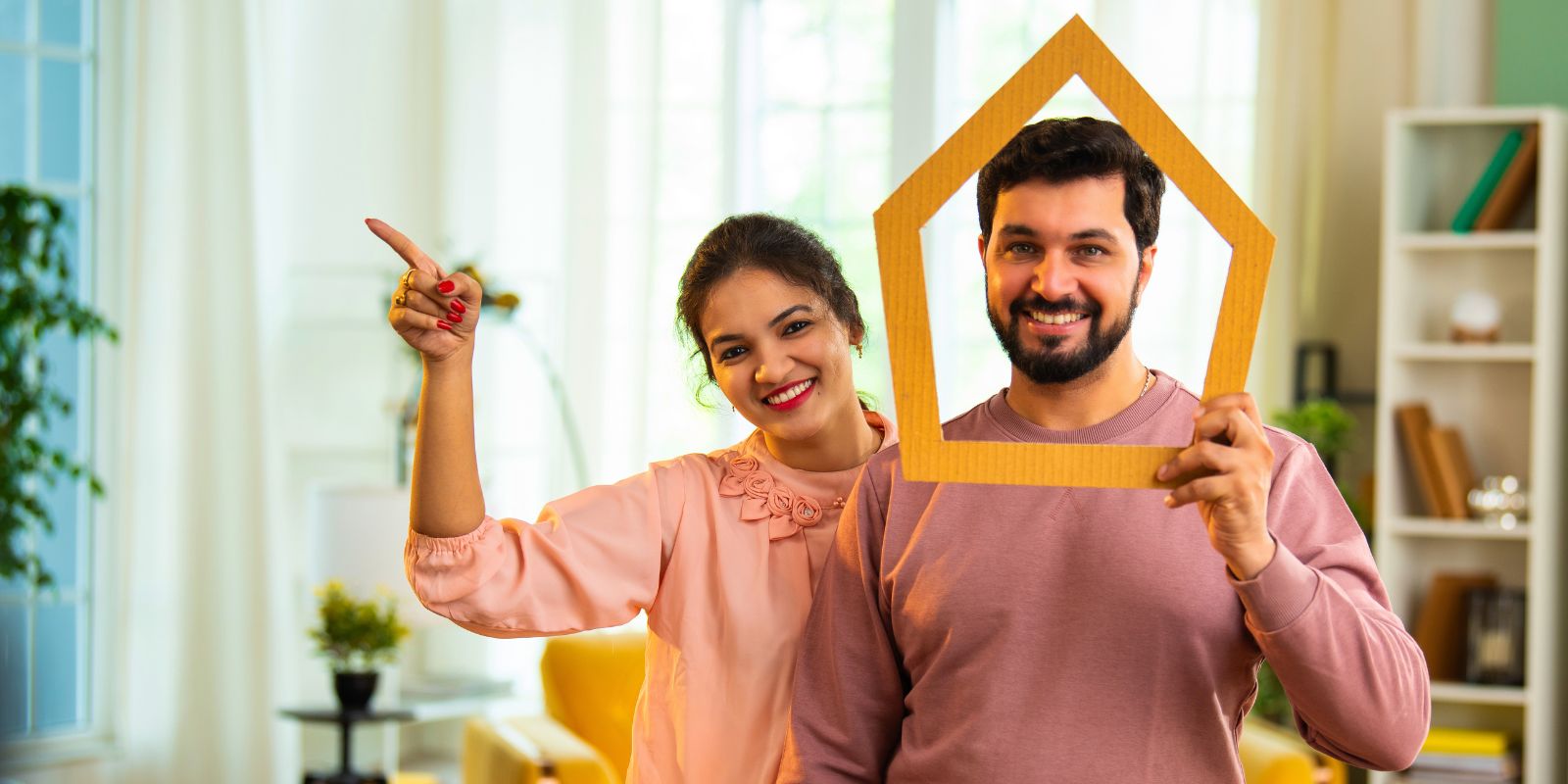 First home buyers at their new home - first home owner grant with Ezy Loans Australia