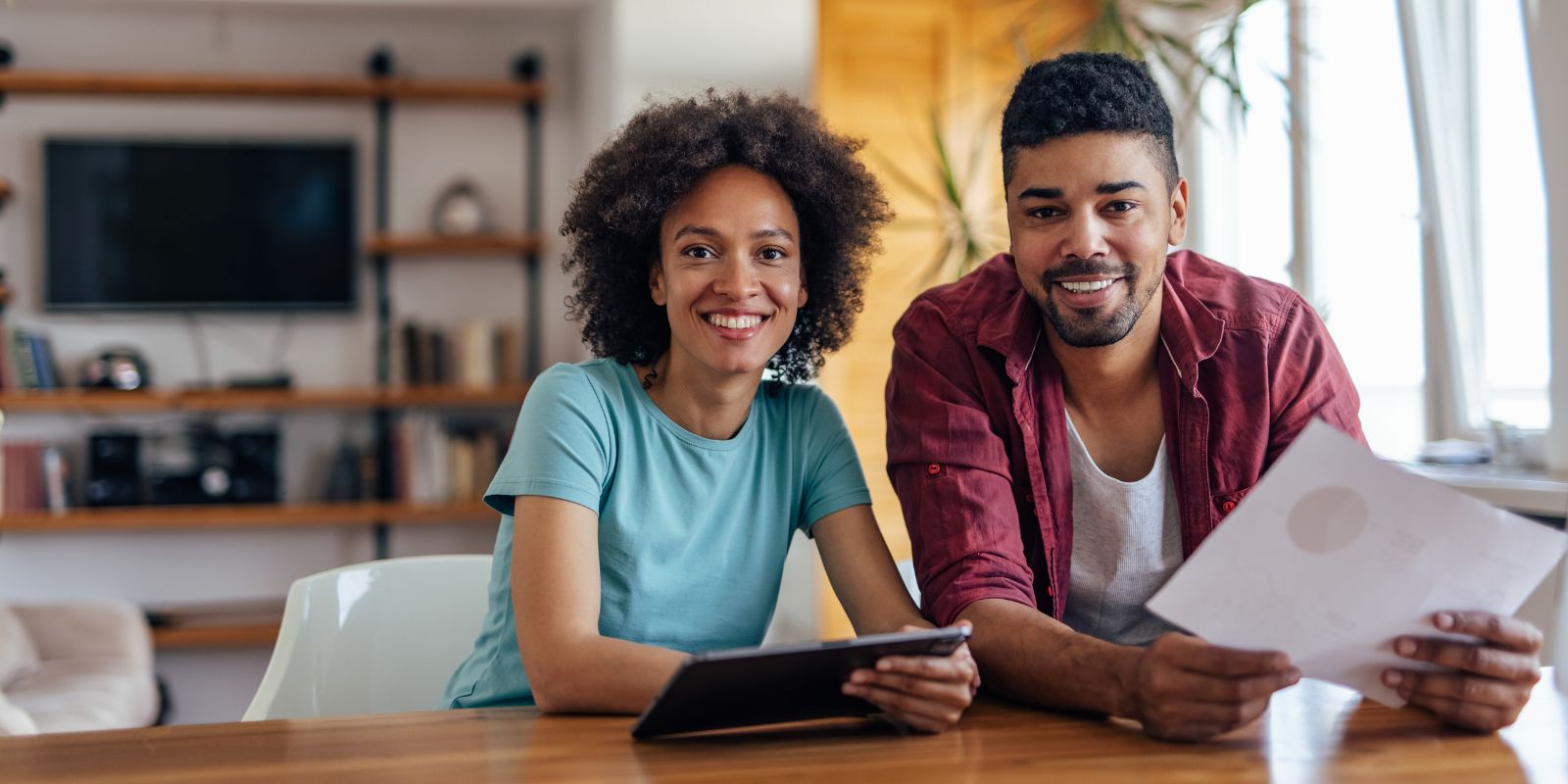 A homeowner reviewing their home loan - refinancing guide with Ezy Loans Australia